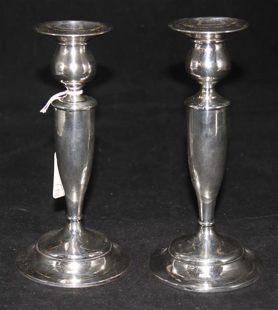 A pair of sterling silver candlesticks, 8in.